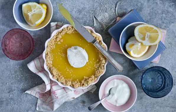 Picture pie, knife, glasses, lemons, lemon pie