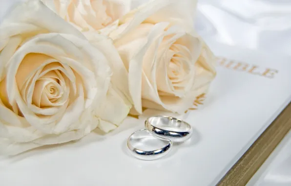 Flowers, flowers, engagement rings, wedding rings