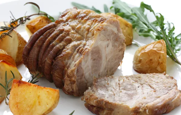 Greens, baked meat, baked potatoes, meat dish