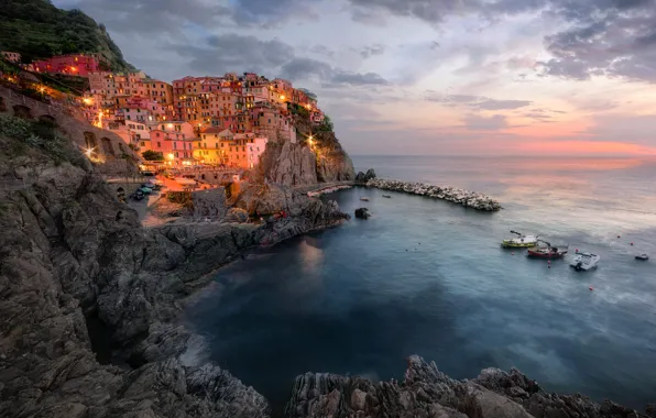 Sea, the sky, clouds, sunset, the city, lights, stones, rocks