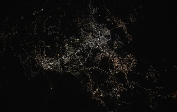 The city, lights, view from space, silhouettes