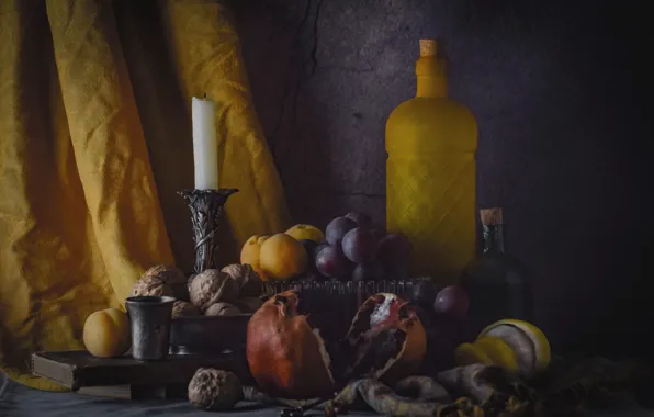 The dark background, food, candle, grapes, fabric, bottle, fruit, nuts