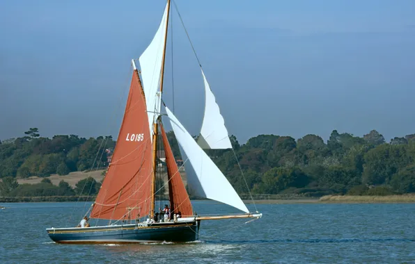 Sea, the sky, shore, sailboat