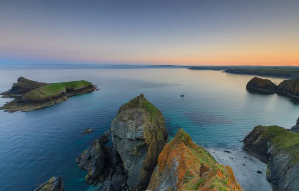 Sea, the sky, rocks, the evening