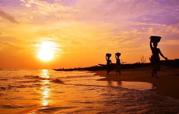 Sea, women, the sun, the evening, India, surf