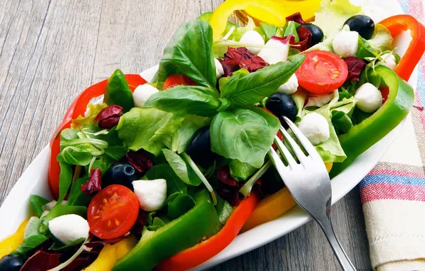 Picture cheese, plate, pepper, plug, tomatoes, napkin, salad, olives