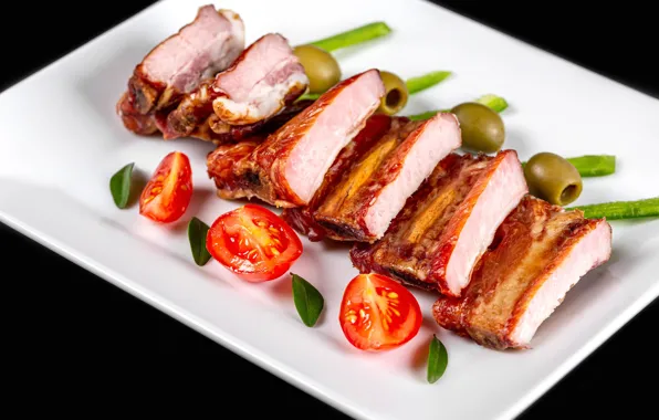 Meat, vegetables, tomatoes, olives, dish