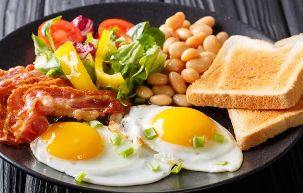 Bread, pepper, scrambled eggs, vegetables, bacon, beans