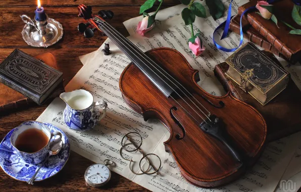 Notes, tea, violin, watch, books, roses, milk, glasses
