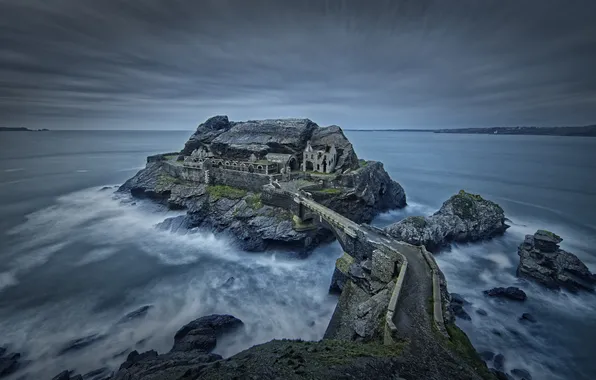 Sea, wave, clouds, bridge, house, stones, castle, overcast