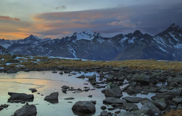 Mountains, stones, shore, tops, twilight, pond