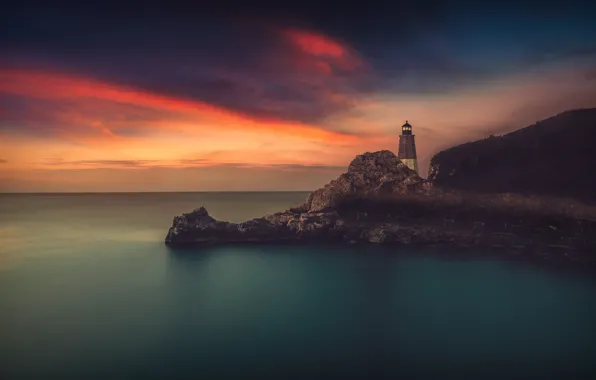 Sea, the sky, rocks, shore, lighthouse