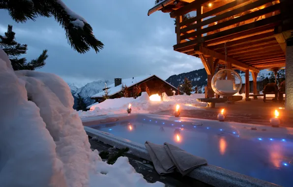 Snow, chairs, Jacuzzi, houses, mountains.