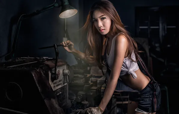 Picture girl, gloves, workshop, machine, shift