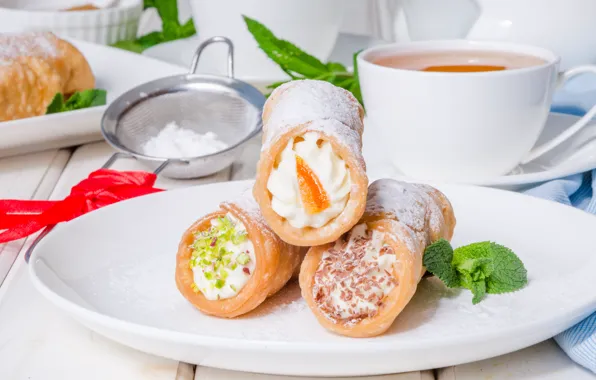 Cheese, cake, nuts, cream, tube, powdered sugar, cannoli, ricotta