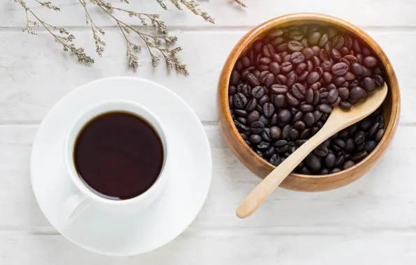 Coffee, spoon, coffee beans, branch greenery