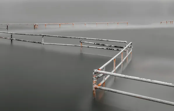 Pipe, fog, the fence