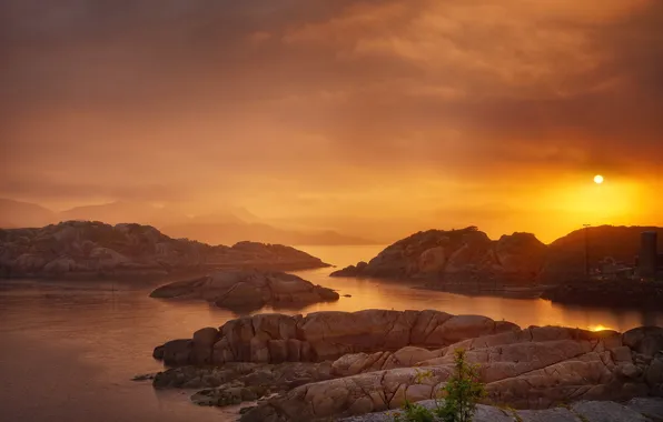 The sun, sunset, mountains, stones, rocks, shore, pond