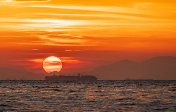 The sun, clouds, sunset, mountains, fog, shore, ship, haze