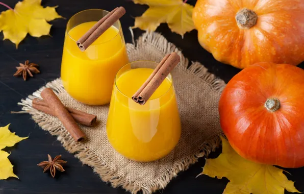 Glasses, juice, pumpkin, cinnamon, burlap, maple leaves, pumpkin