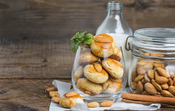 Milk, cookies, nuts, cinnamon, cakes, almonds