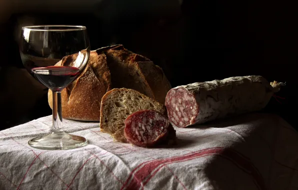 Wine, glass, bread, sausage