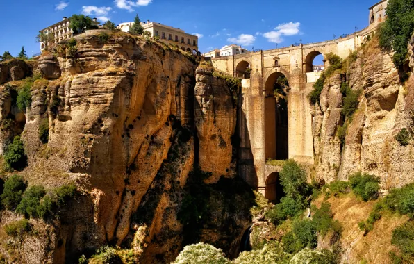 Picture the sky, mountains, bridge, rocks, home, arch, gorge, Spain