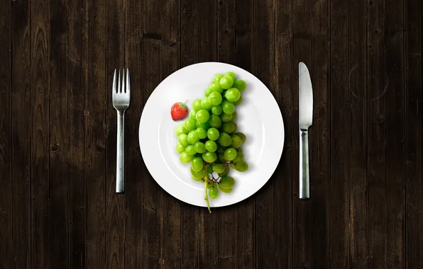 Picture plate, grapes, fork, knife