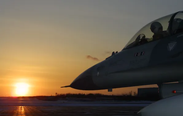 Snow, sunset, the plane