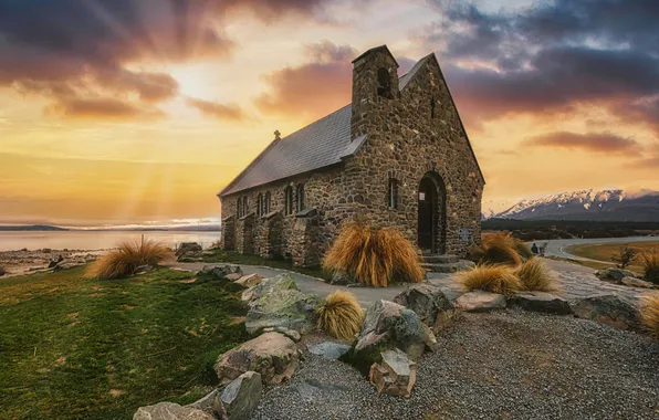 The sky, grass, the sun, clouds, rays, mountains, pebbles, stones