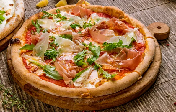 Picture cheese, pizza, bacon, arugula