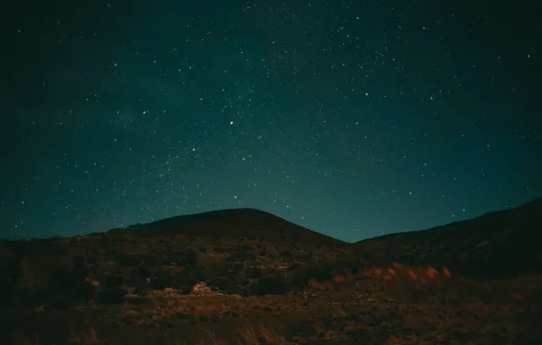 hills at night with stars