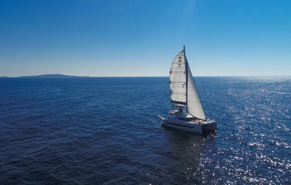 Islands, the ocean, sails, catamaran, blue sky, sea romance, sailing, a lonely ship