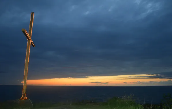 Picture sea, sunset, mountains, cross