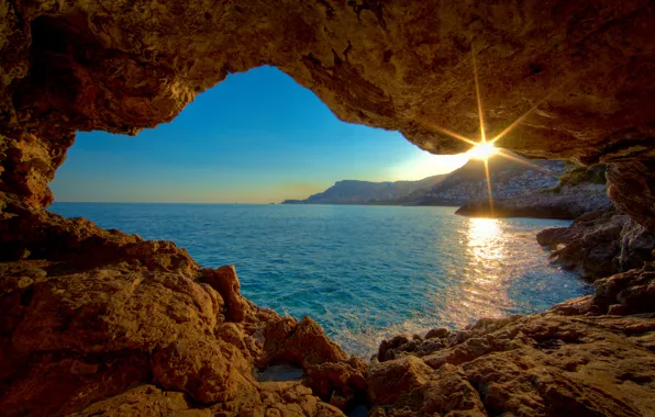 Picture sea, sunset, stones, hole