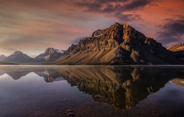 The sky, clouds, mountains, lake, reflection, stones, rocks, the slopes