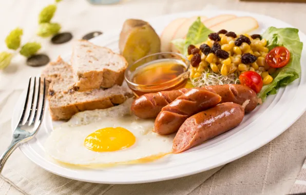 Picture sausage, bread, scrambled eggs, salad