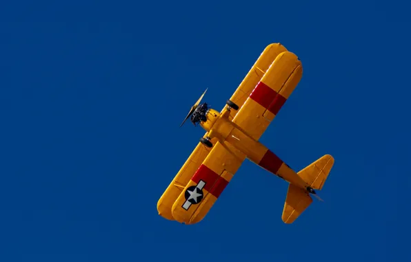 Picture the sky, the plane, biplane