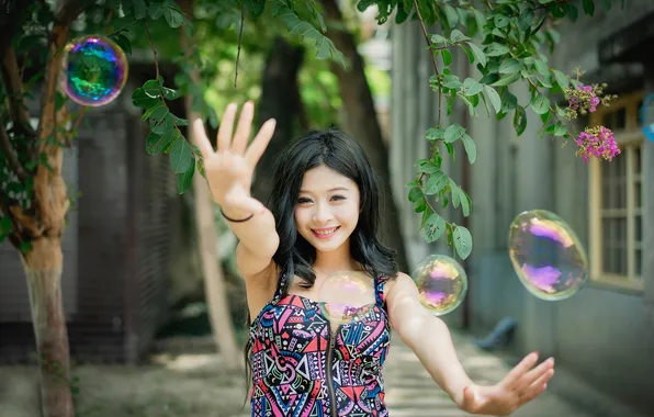 Picture smile, bubbles, Oriental girl