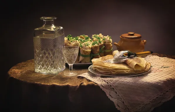 Still life, vodka, pancakes, rolls