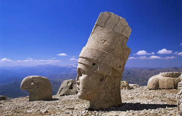 Tops, statues, stone, mountains