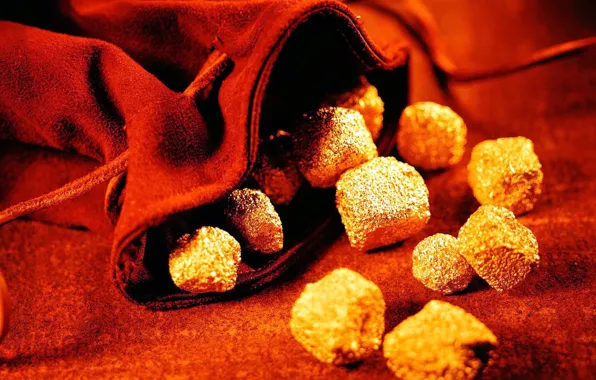 Stones, gold, bag, red background