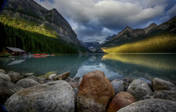 The sky, trees, mountains, lake, boats