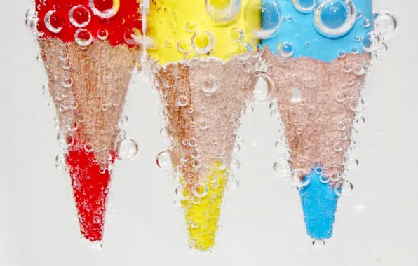 Water, yellow, red, bubbles, blue, pencils
