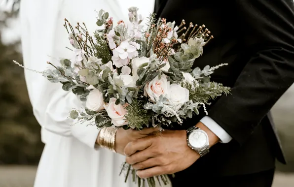 Watch, bracelets, a bouquet of flowers, wedding, celebration, blurred background, the bride and groom