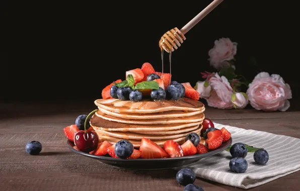 Berries, honey, pancakes