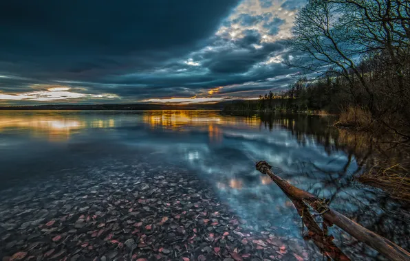 The sky, clouds, lake, stones, the evening