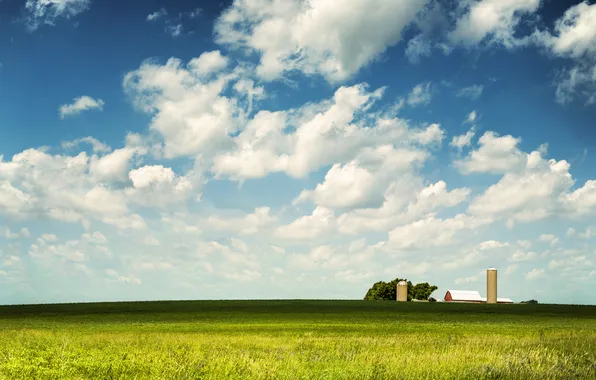 Picture the sky, grass, clouds, horizon, farm, barns, 2. tree