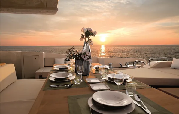Picture the ocean, the evening, yacht, dinner