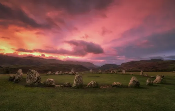 Field, clouds, sunset, mountains, stones, megaliths